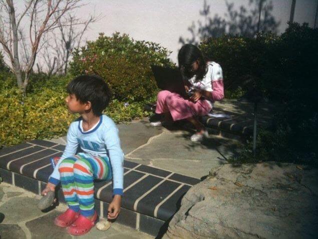 Anjali Pichai's kids playing with rocks and doing project research in 2011.